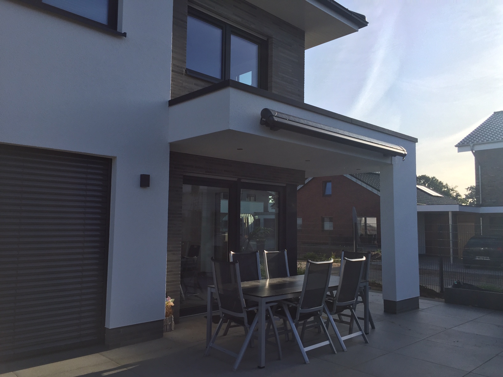 Terrassenüberdachung eines zweigeschossigen Neubau Einfamilienhauses in Ibbenbüren (NRW)